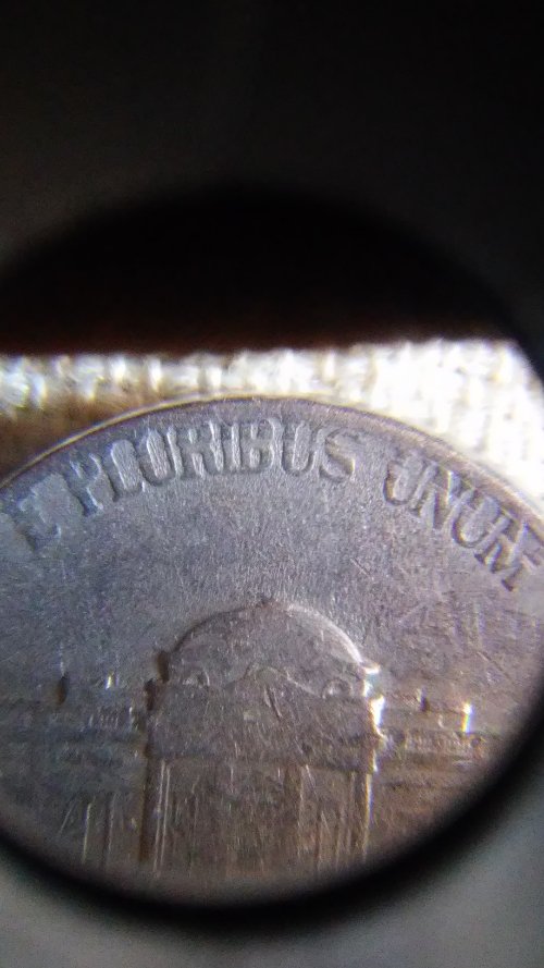 1971-D-Nickel-Has-A-Ring-Cut-Around-It-On-The-Reverse-Side